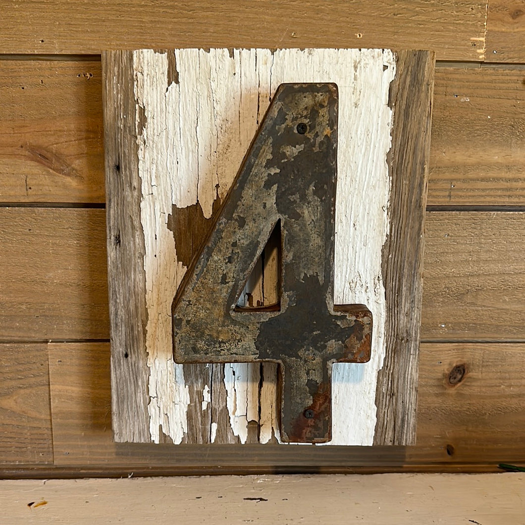 Rusty 4 on chippy white reclaimed wood