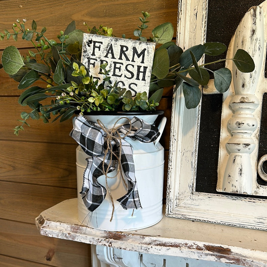 Milk can arrangement