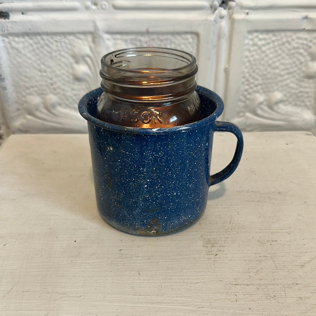 Rusty blue enamel cup