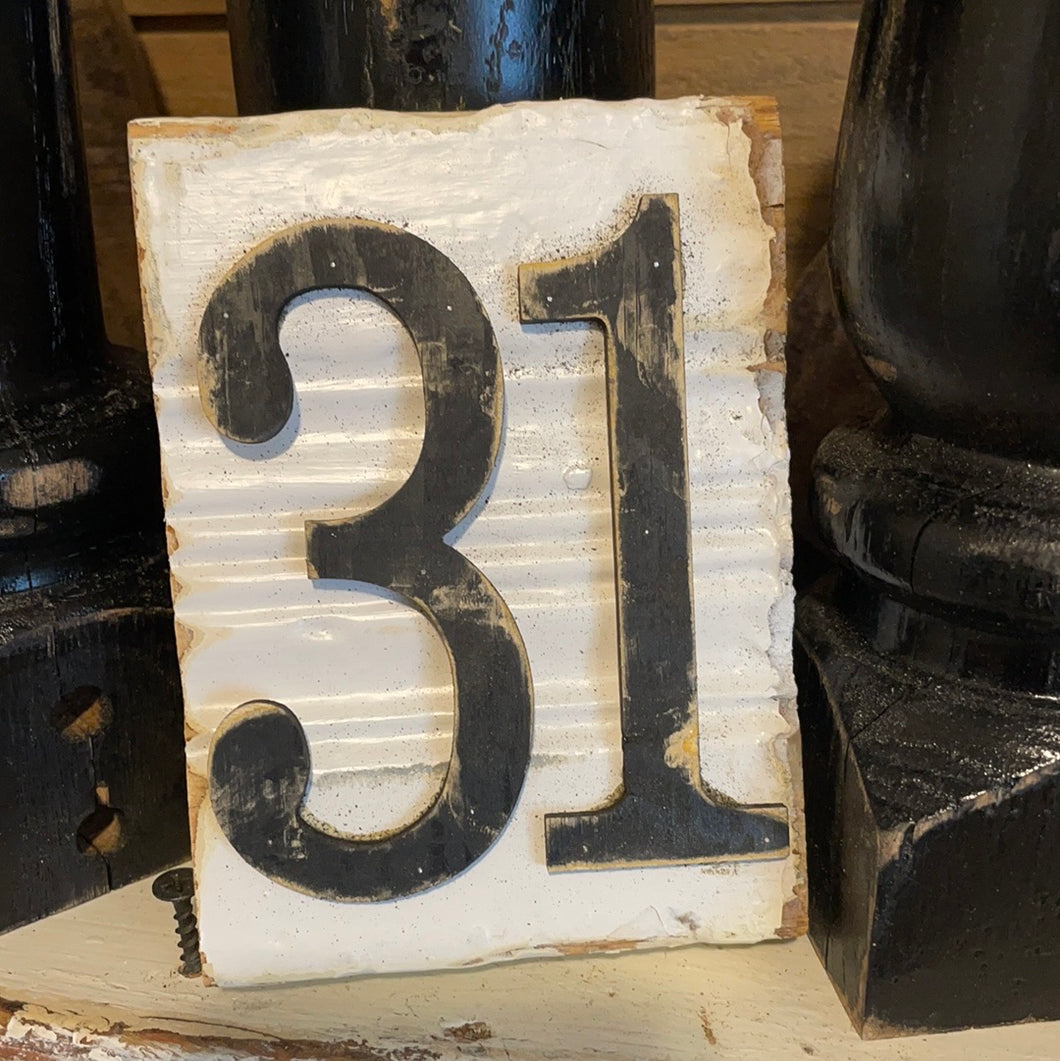 Small 31 on molding trim piece