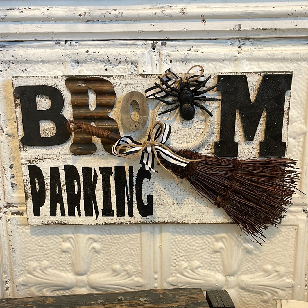 Broom parking sign