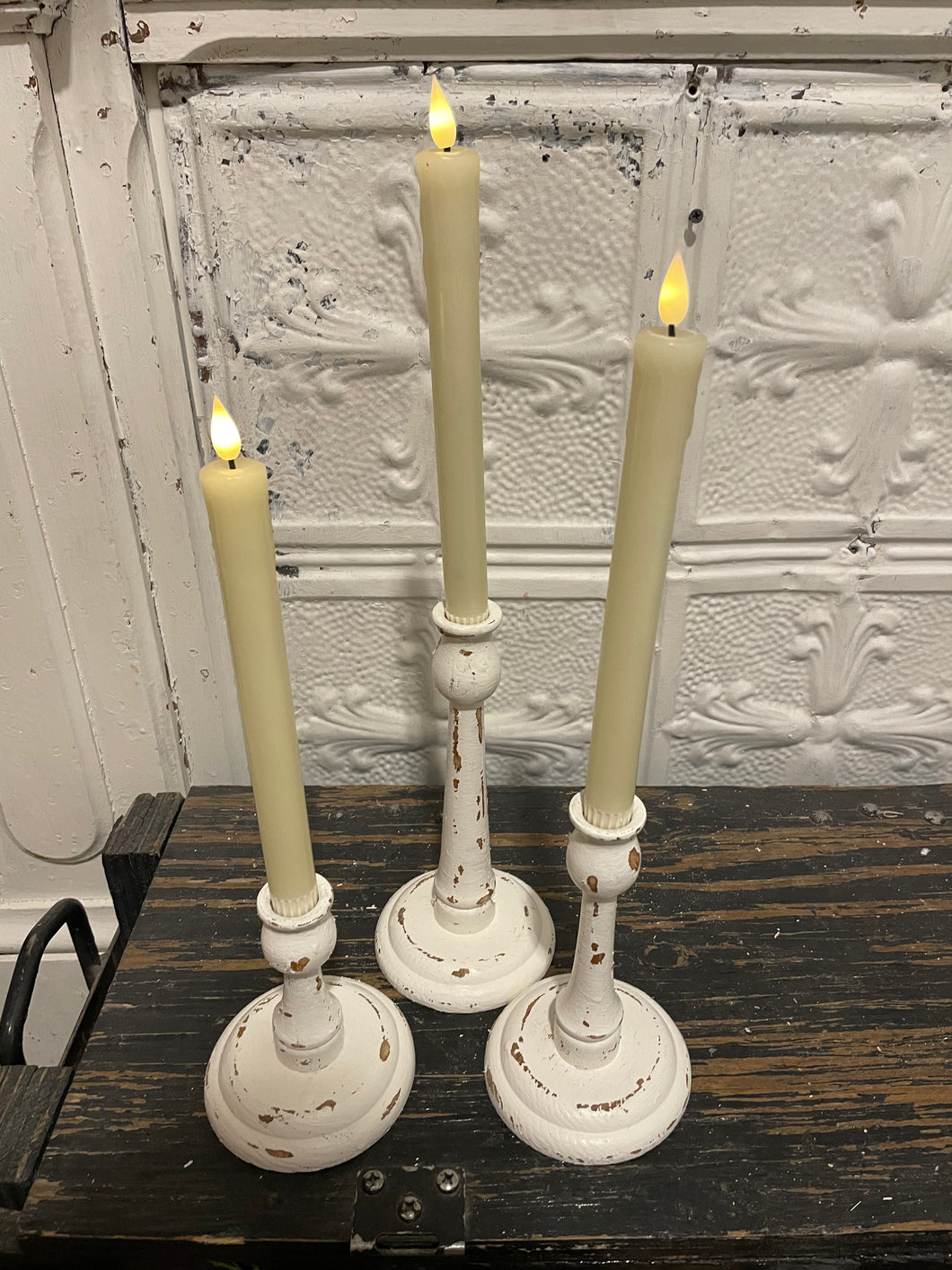 Set of 3 white candlestick holders