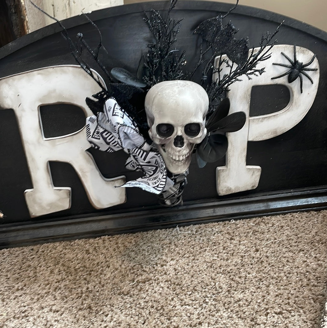Big rip tombstone sign