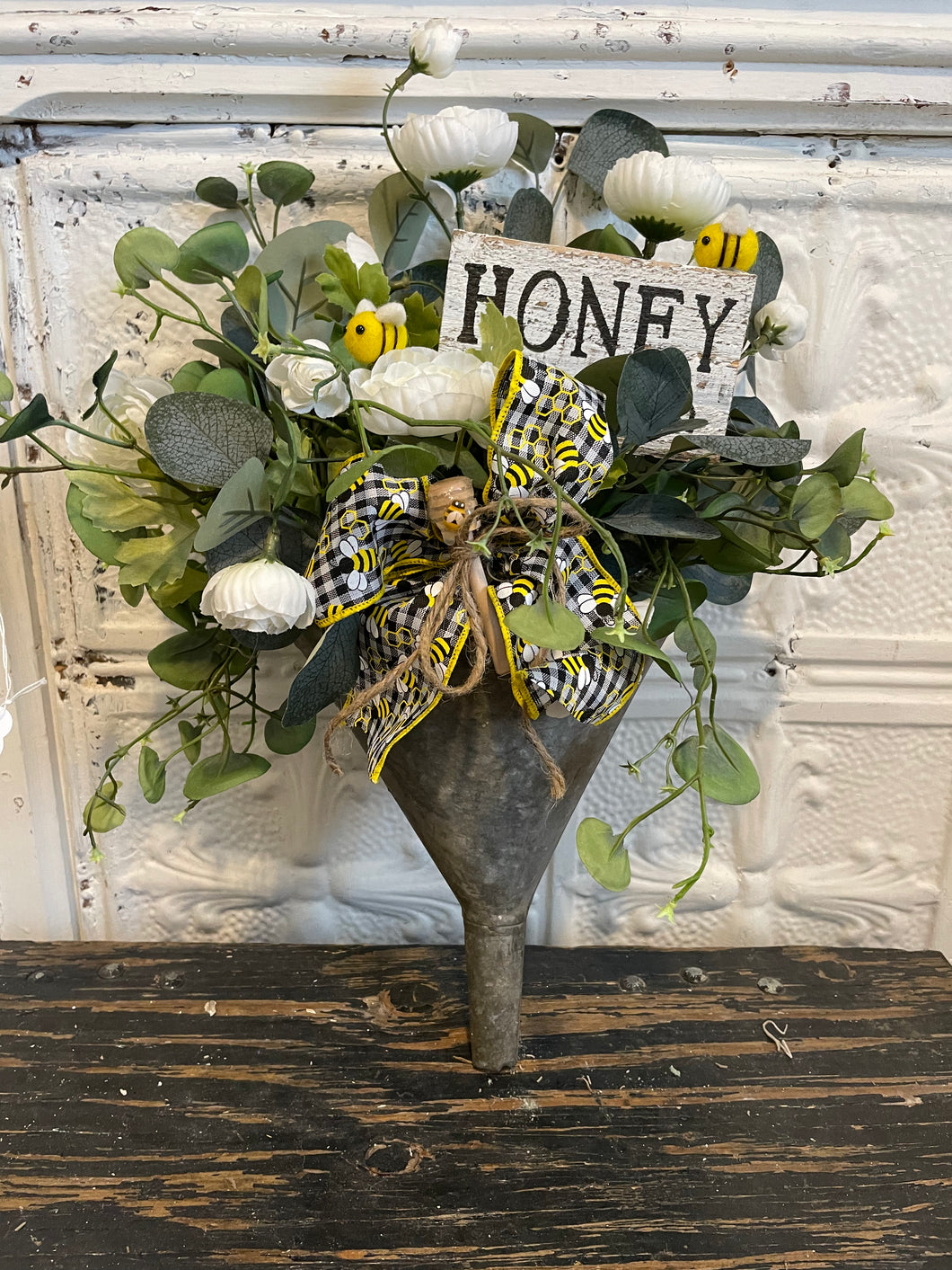 Antique funnel bee arrangement
