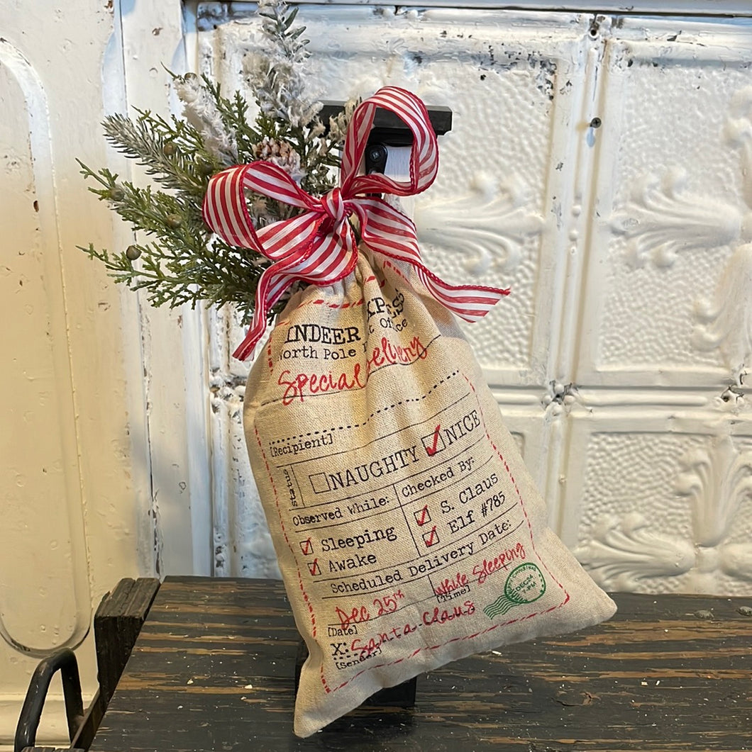 Santa bag hanging on small post