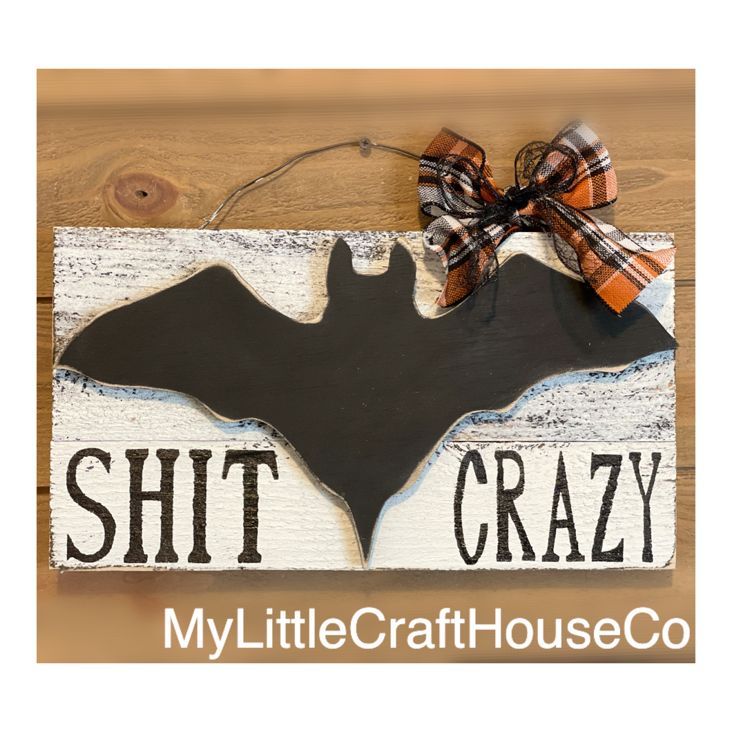 Bat shit crazy sign