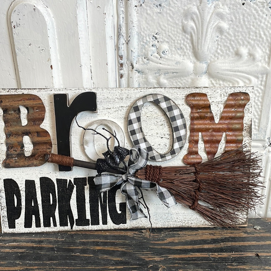 Broom parking sign