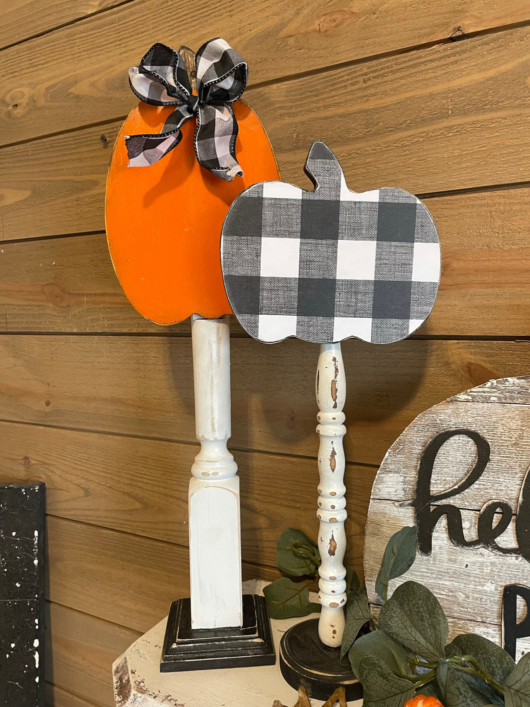Plaid pumpkins on spindles