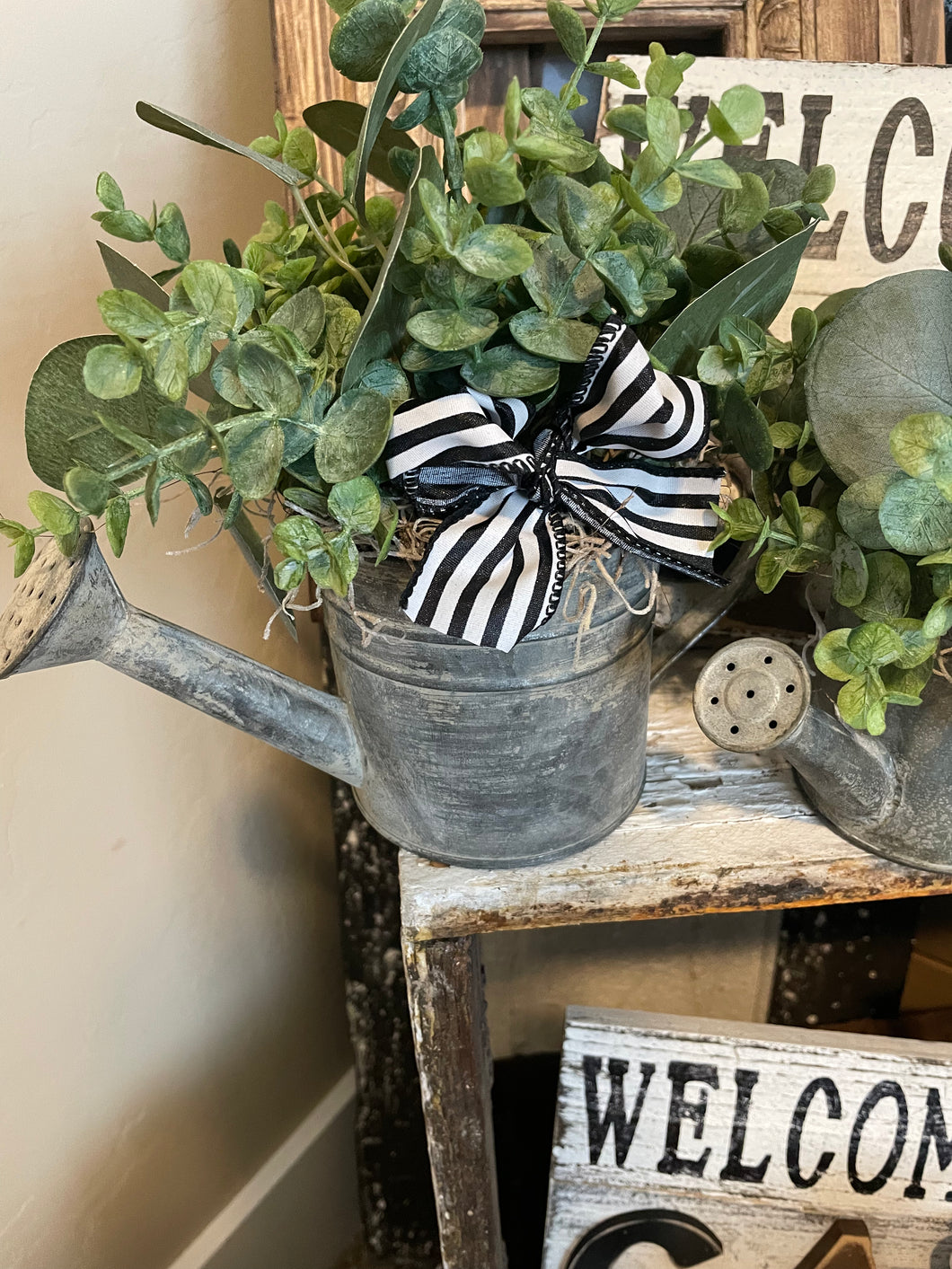 Large watering can arrangement