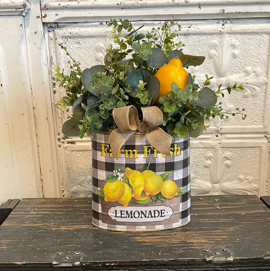 Oval bucket lemon arrangement