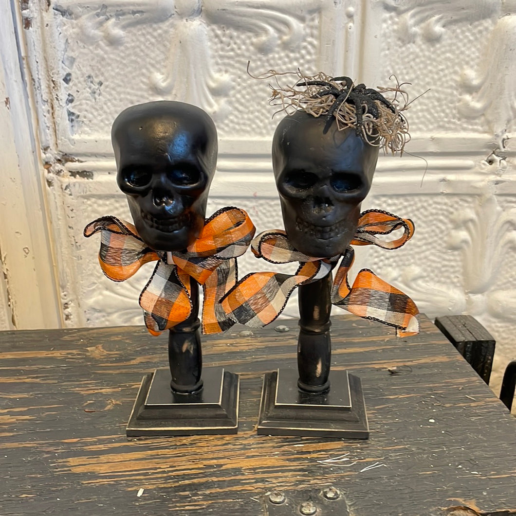 Skeleton head set of 2on spindles