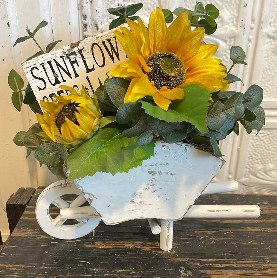 Wheelbarrow sunflower arrangement