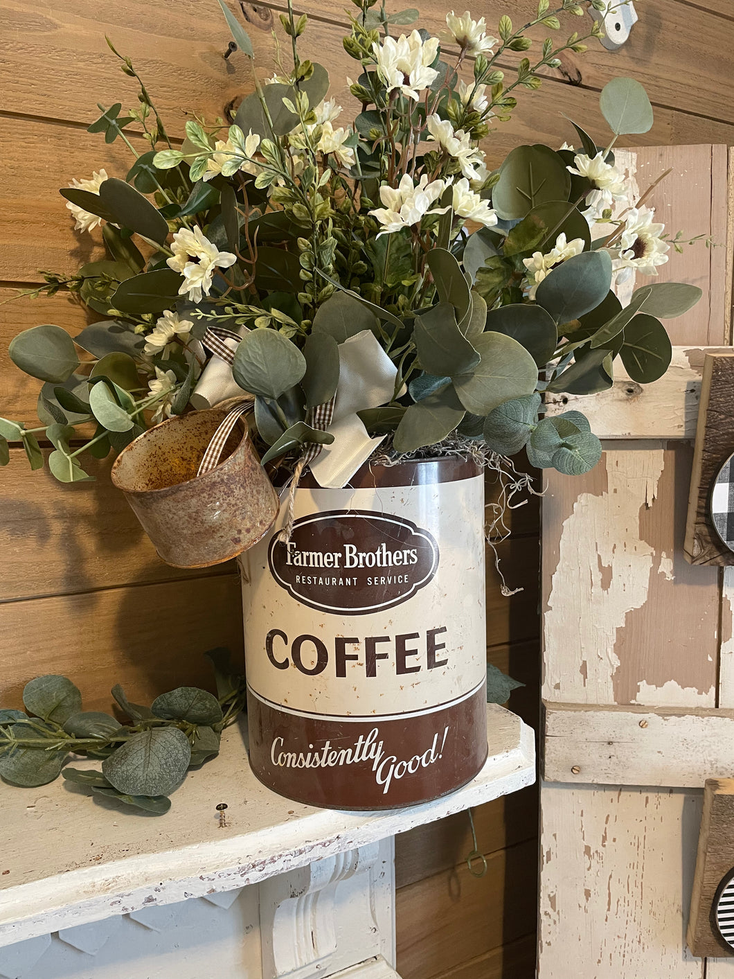 Antique coffee container arrangement