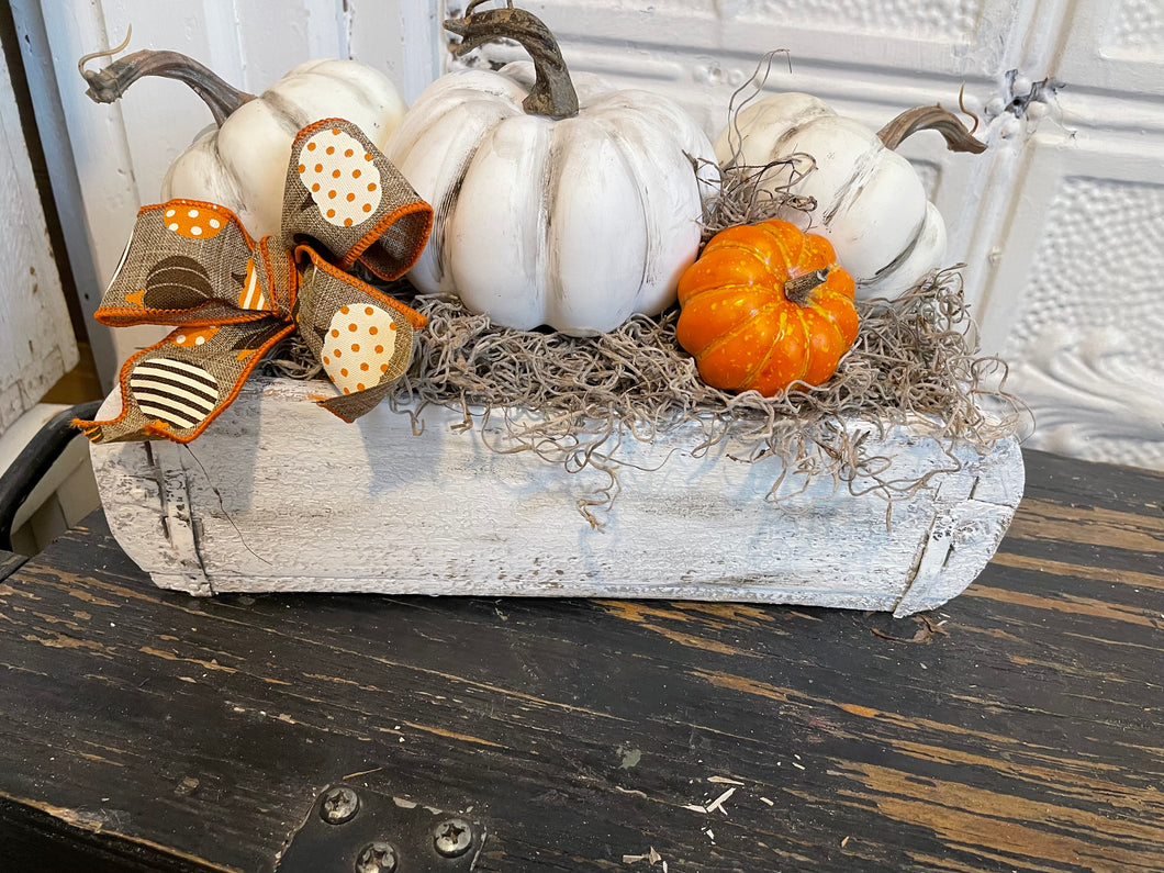 Pumpkin arrangement in antique brick mold