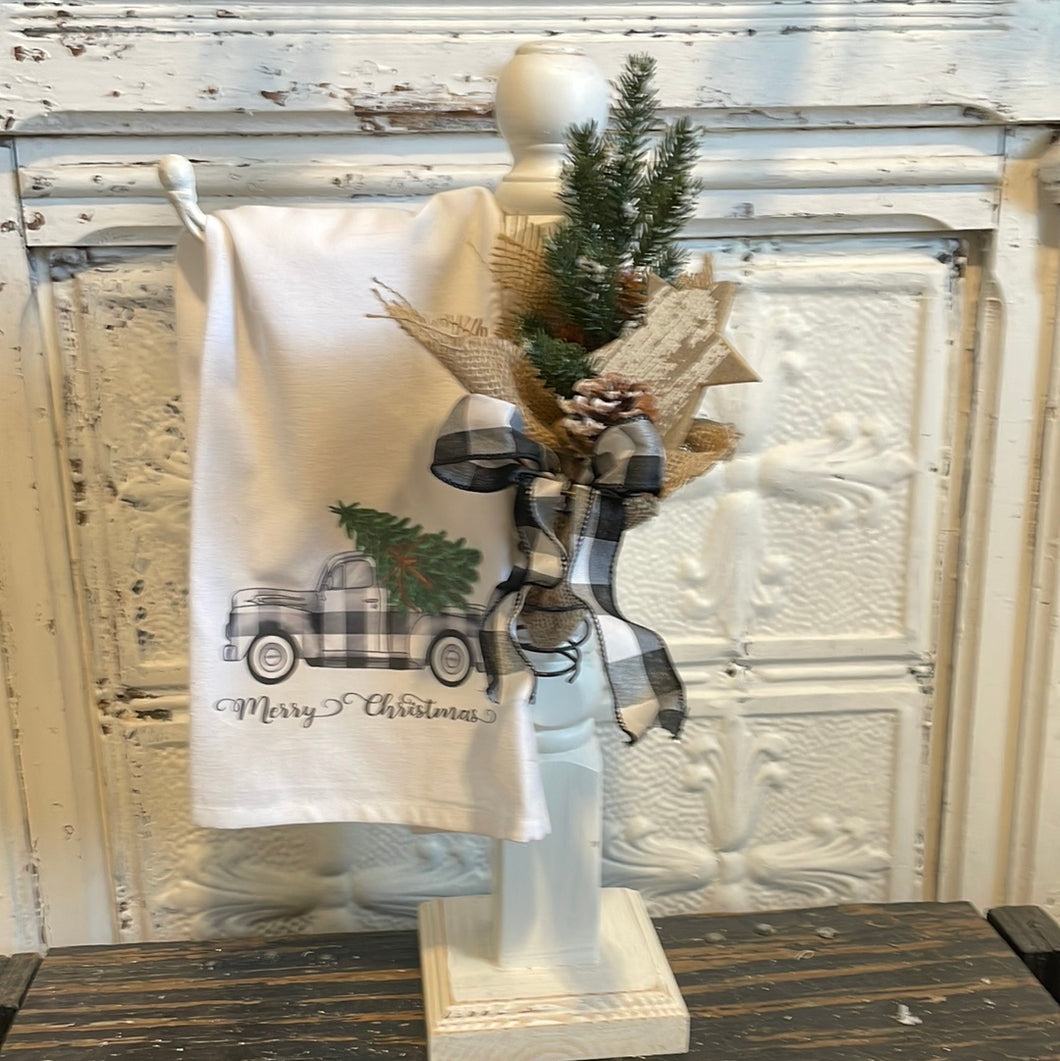 White towel holder w/tea towel and spring.