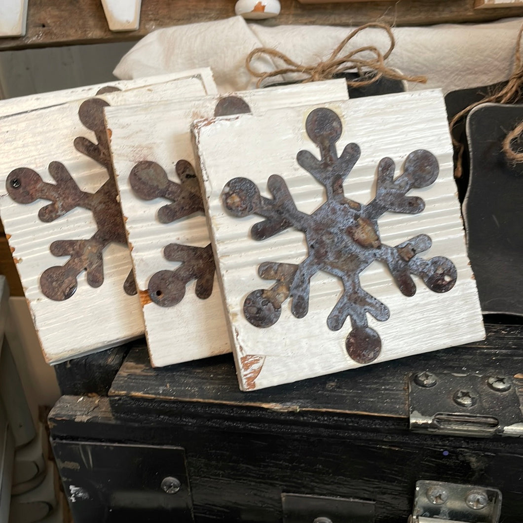 Rusted snowflake on molding
